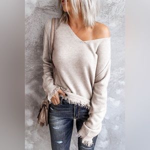 Exposed Seam V-Neck Fringe Hem Knit Top